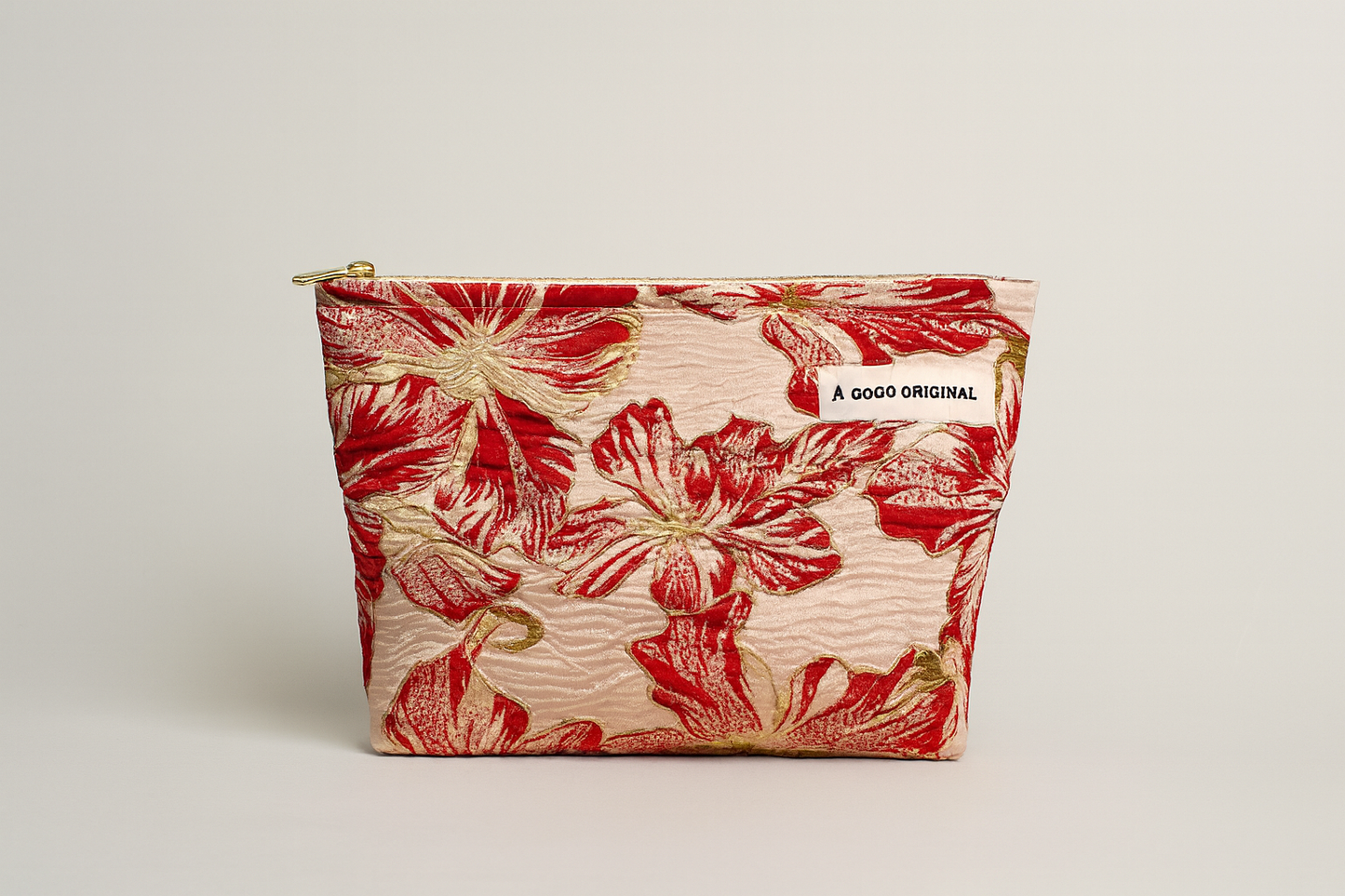 Make-up tas rode bloemen met gouden accenten