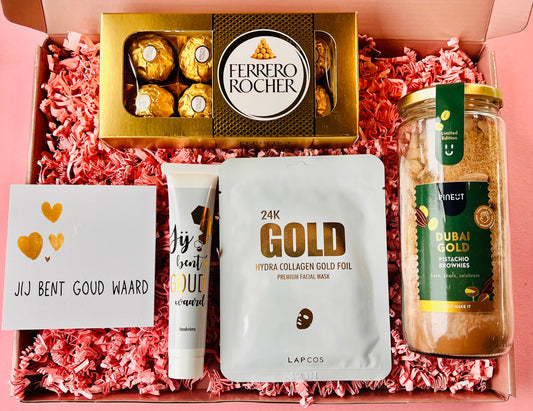 Jij bent Goud Waard cadeaubox – luxe gouden cadeaupakket met bakmix, masker, handcrème, Ferrero Rocher en gouden tegel