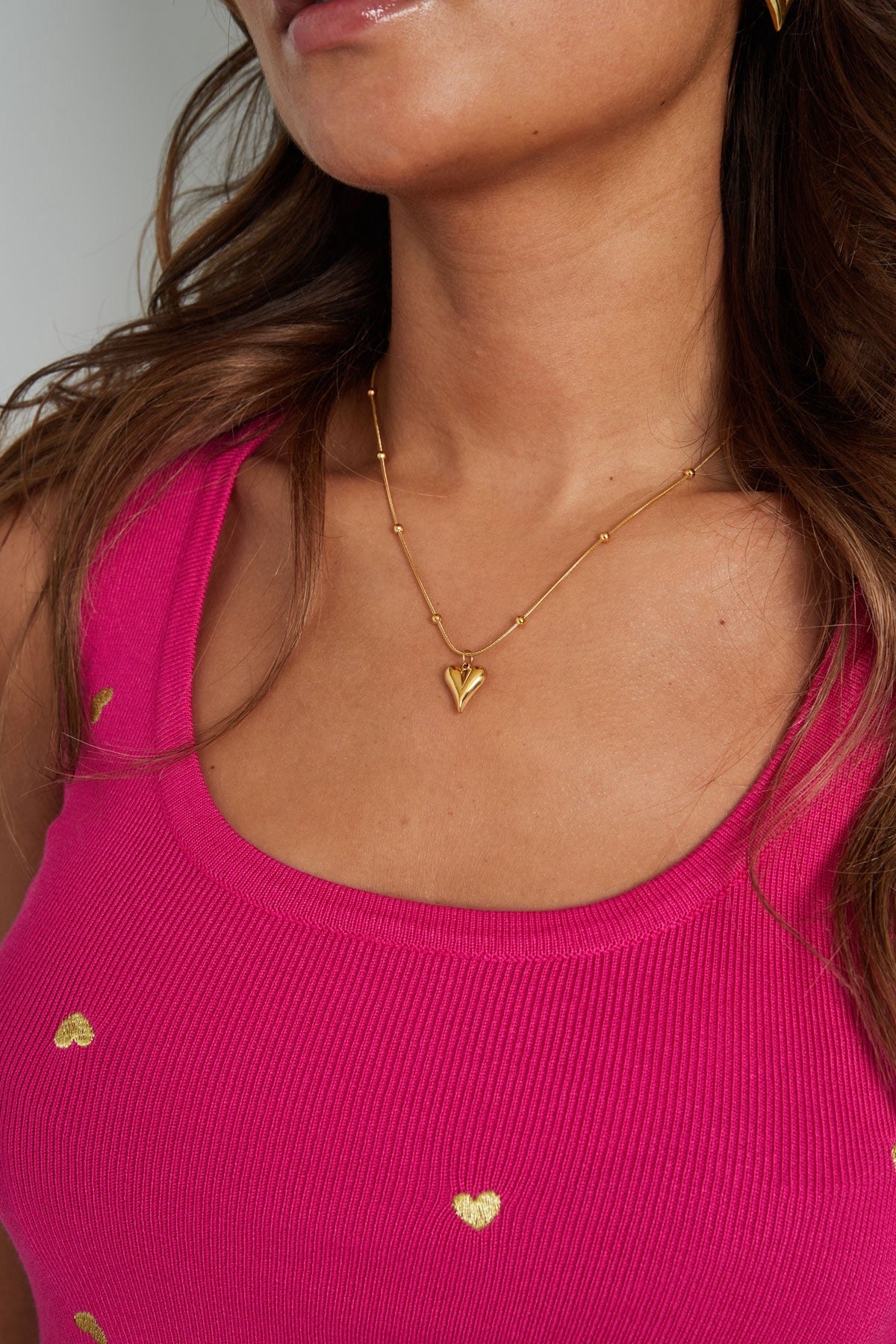 Zilver bolletjes ketting met hartje
