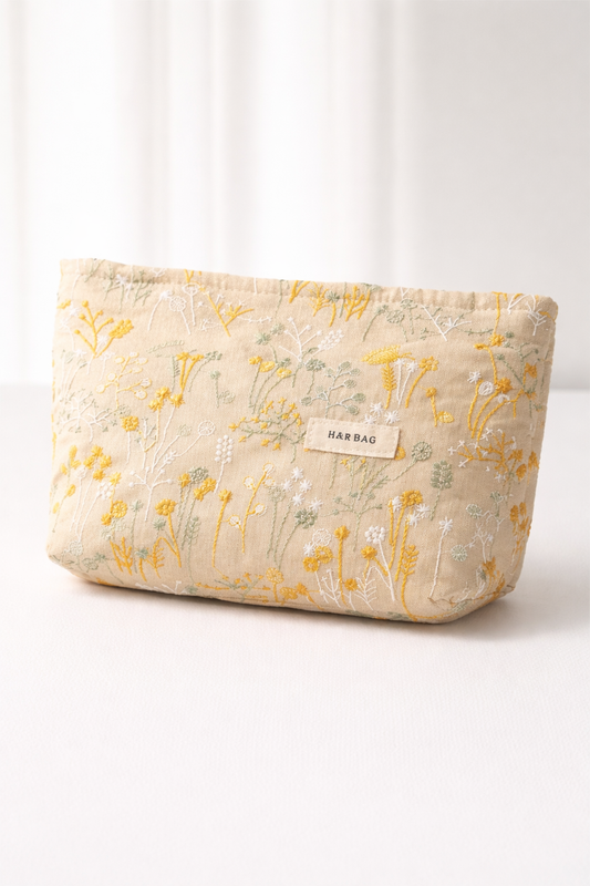 Make-up tas geel met bloemenprint, compacte beauty pouch met rits