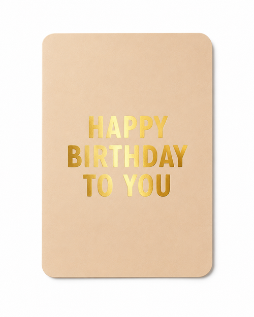 Luxe beige verjaardagskaart met gouden folie en de tekst “Happy Birthday To You”. Perfect als verjaardagskaart of toevoeging aan een cadeaubox van The Prezzent.