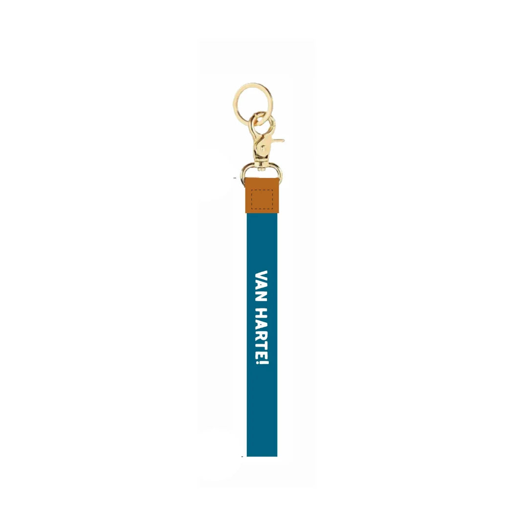 Blauwe sleutelhanger met gouden details en tekst Van Harte
